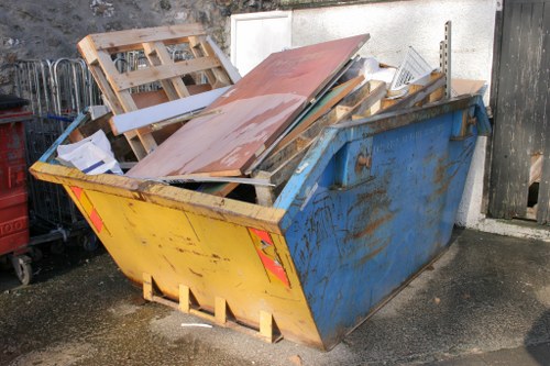 Team members recycling and donating office materials