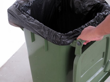 Variety of furniture items being cleared for recycling